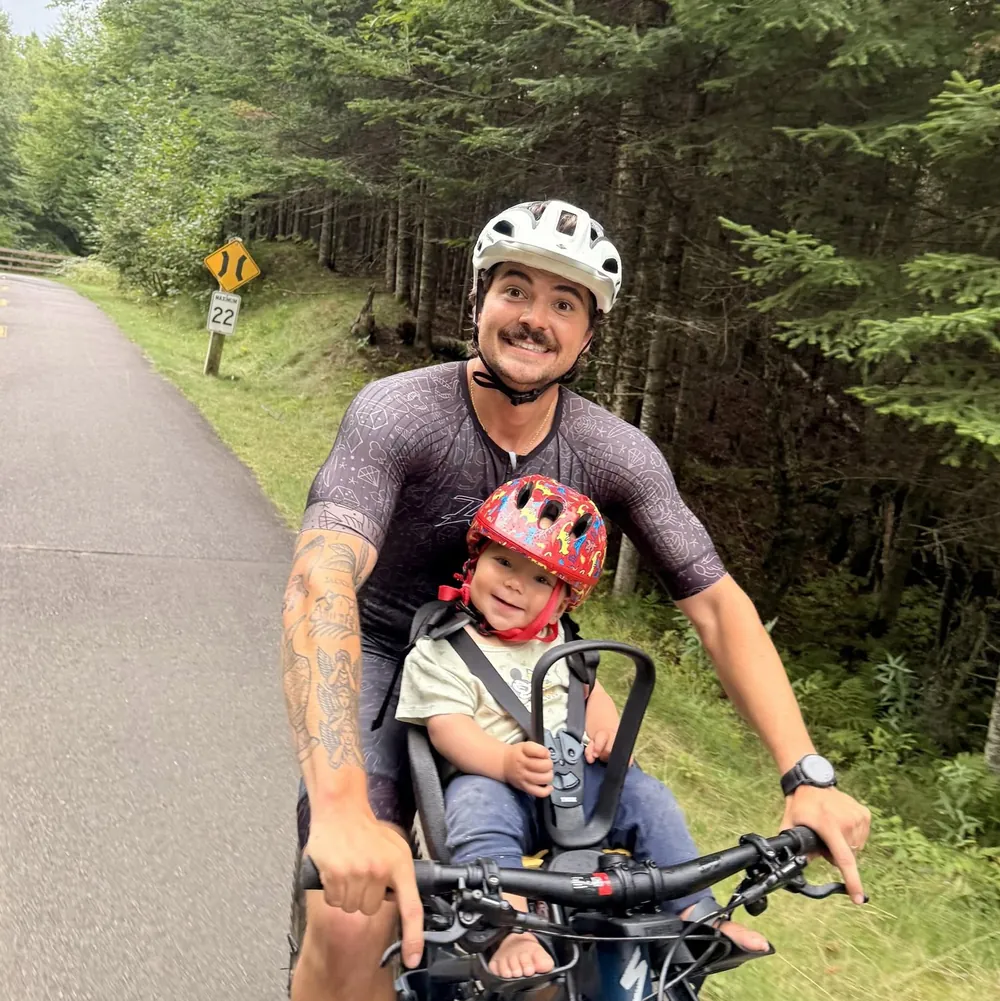 Mike on a bike ride with his son